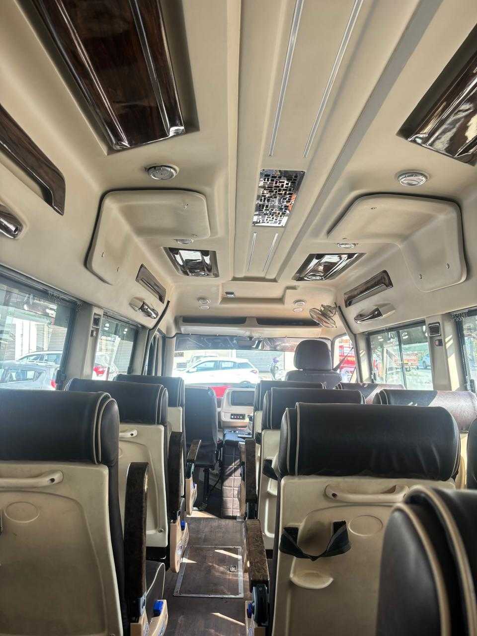 Travel With Sharma 17-seater AC traveller available for booking from Una HP